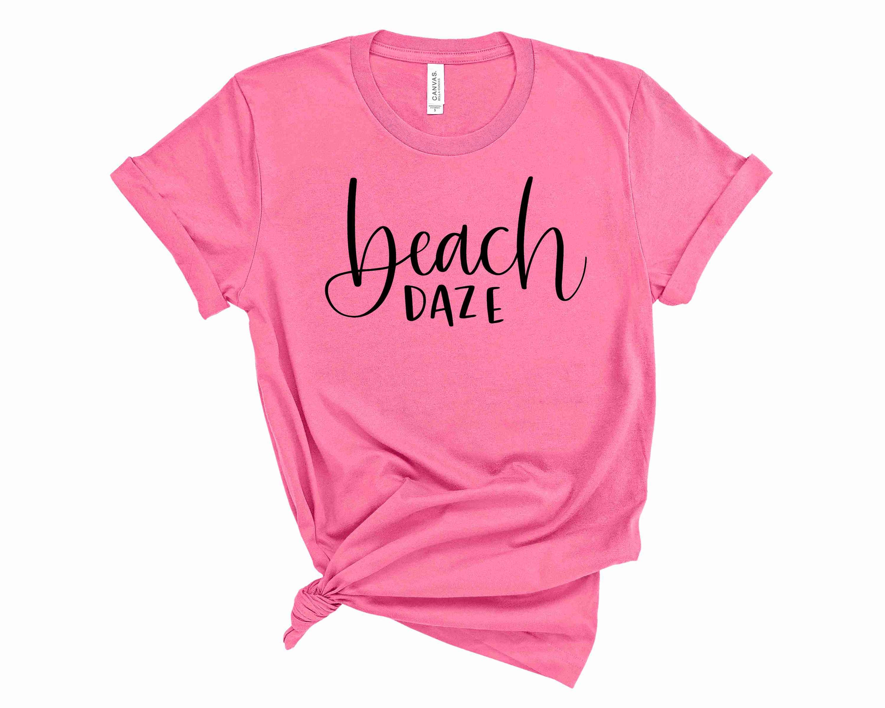 A vibrant unisex graphic tee featuring a beach-themed design, perfect for summer wear.