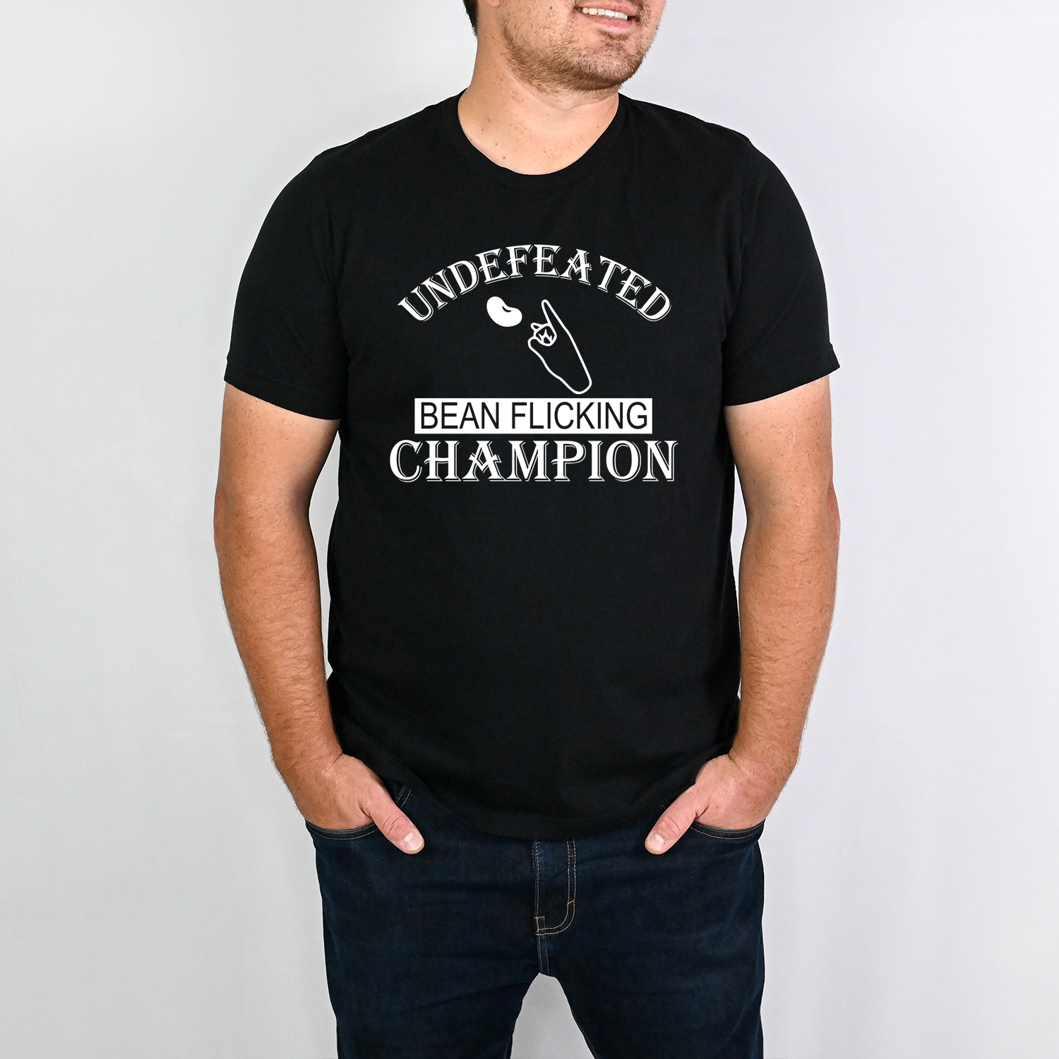 Bean Flicking Champion Unisex T-shirt featuring a humorous graphic design, perfect for casual wear.