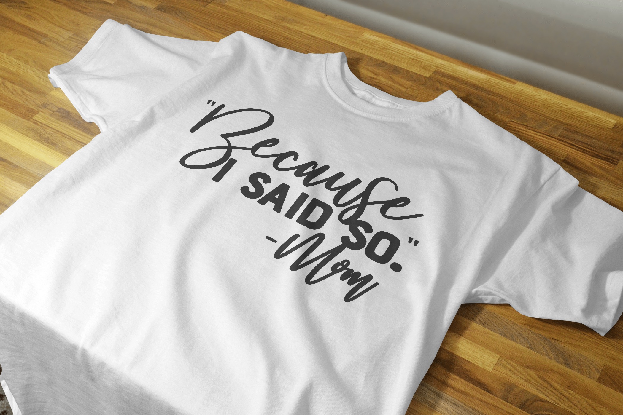 A black unisex shirt featuring the phrase 'Because I Said So' in white lettering, showcasing a classic fit and comfortable design.