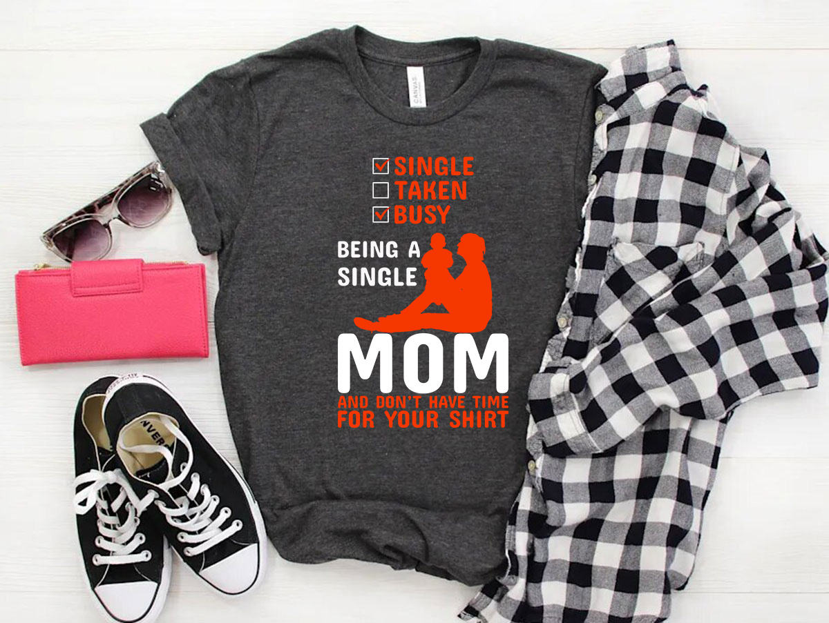 A stylish unisex T-shirt with the phrase 'Being A Single Mom' printed on it, showcasing vibrant colors and a comfortable fit.