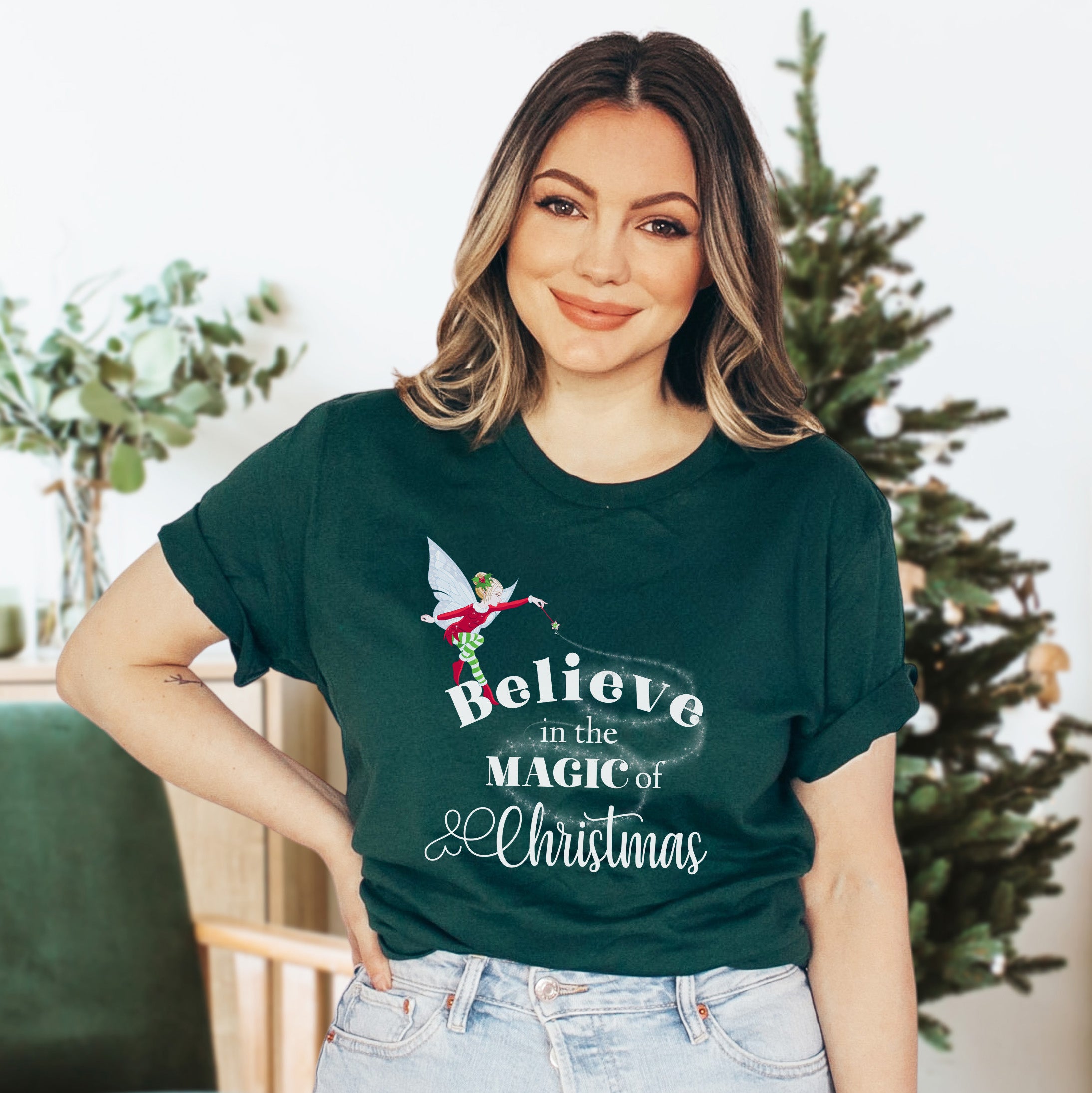 Believe In The Magic Of Christmas Unisex T-shirt featuring vibrant holiday-themed design, perfect for festive occasions.