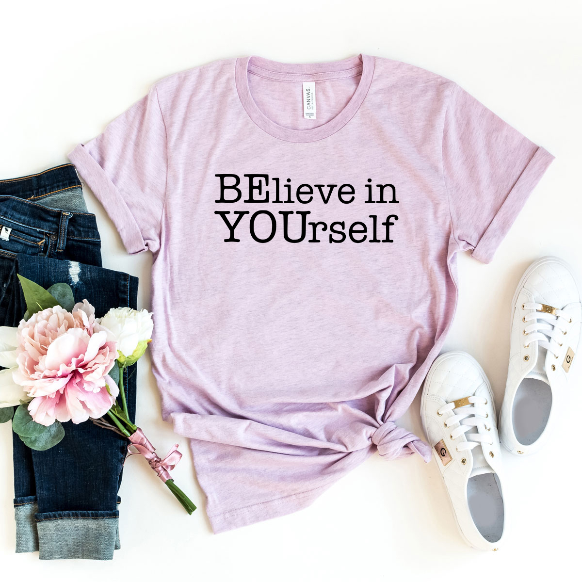 A unisex Believe In Yourself Shirt made from soft ring spun cotton, featuring a high-quality print and available in multiple colors and sizes.