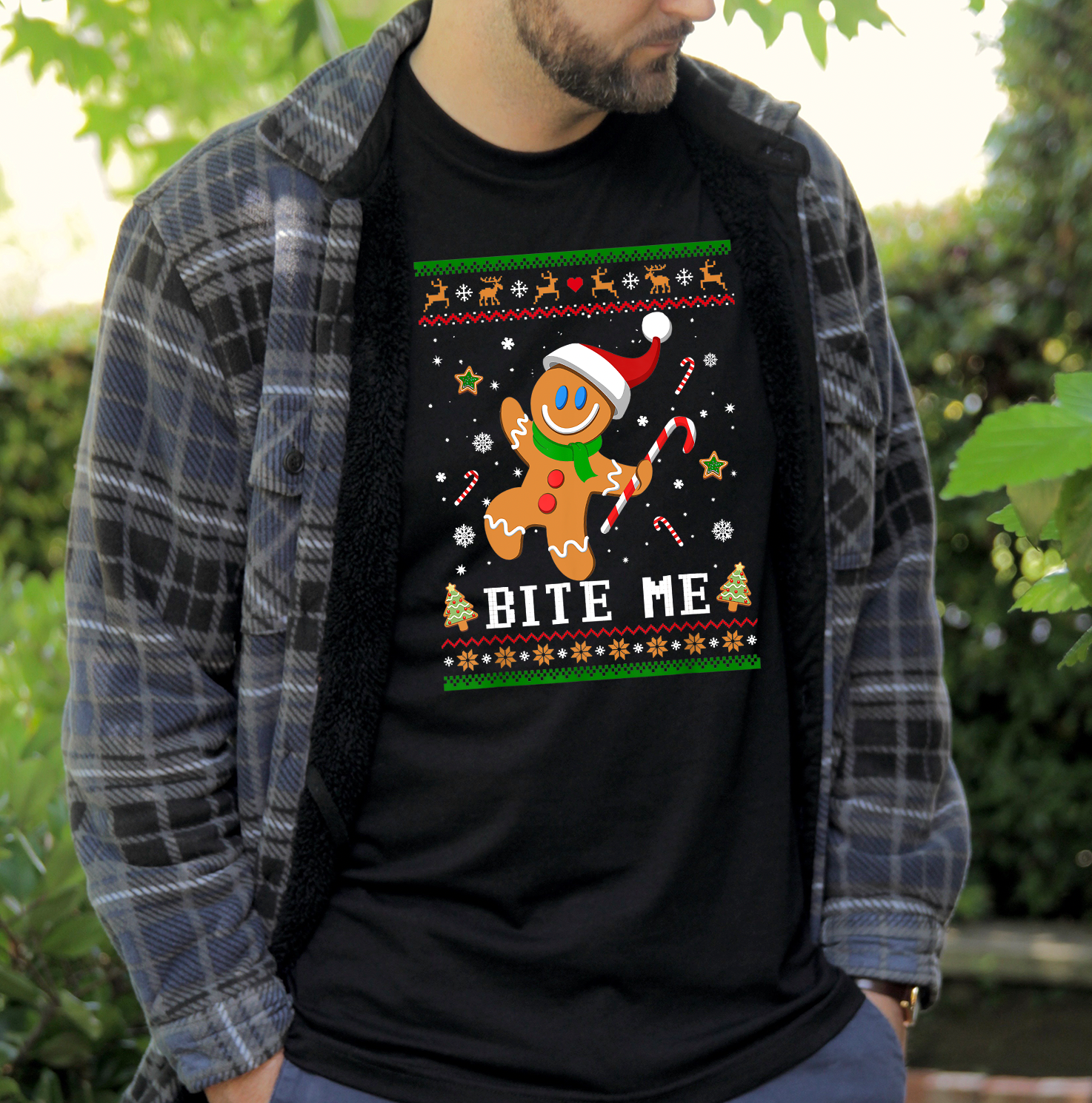 Bite Me Ugly Sweater Unisex T-shirt featuring a festive design, perfect for holiday celebrations.