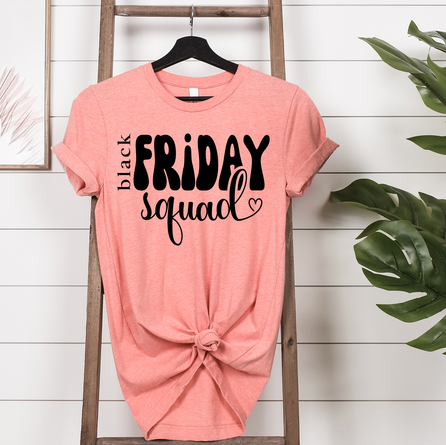 Black Friday Squad Unisex T-shirt featuring vibrant design and soft fabric, perfect for holiday shopping.