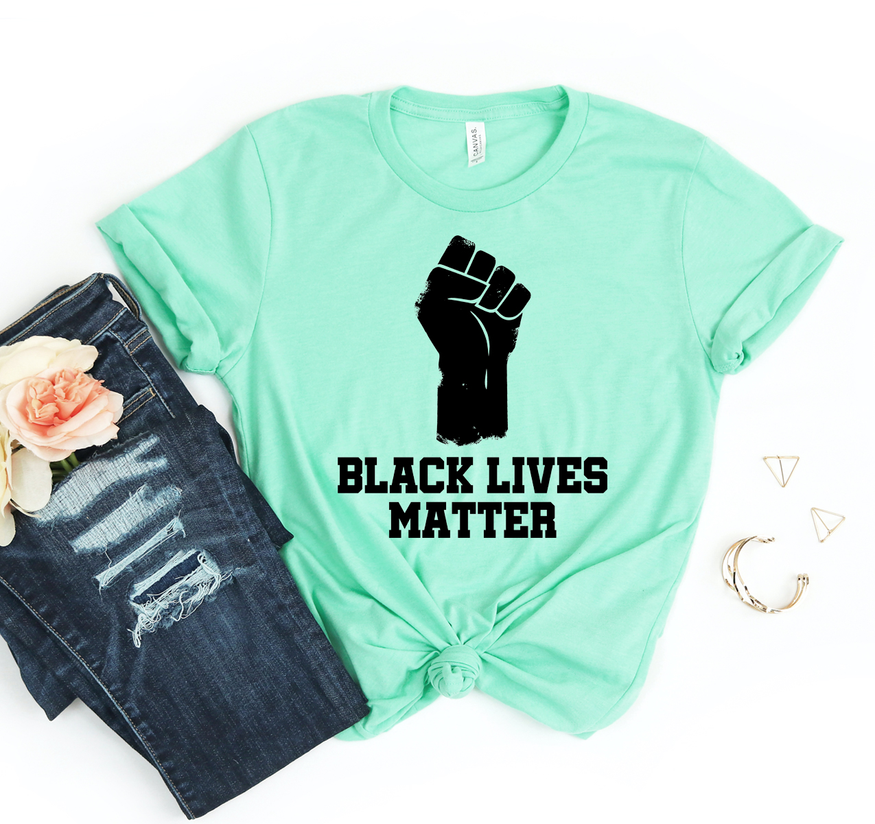 Black Lives Matter T-shirt featuring a unisex design made from soft, breathable cotton fabric, available in various sizes.