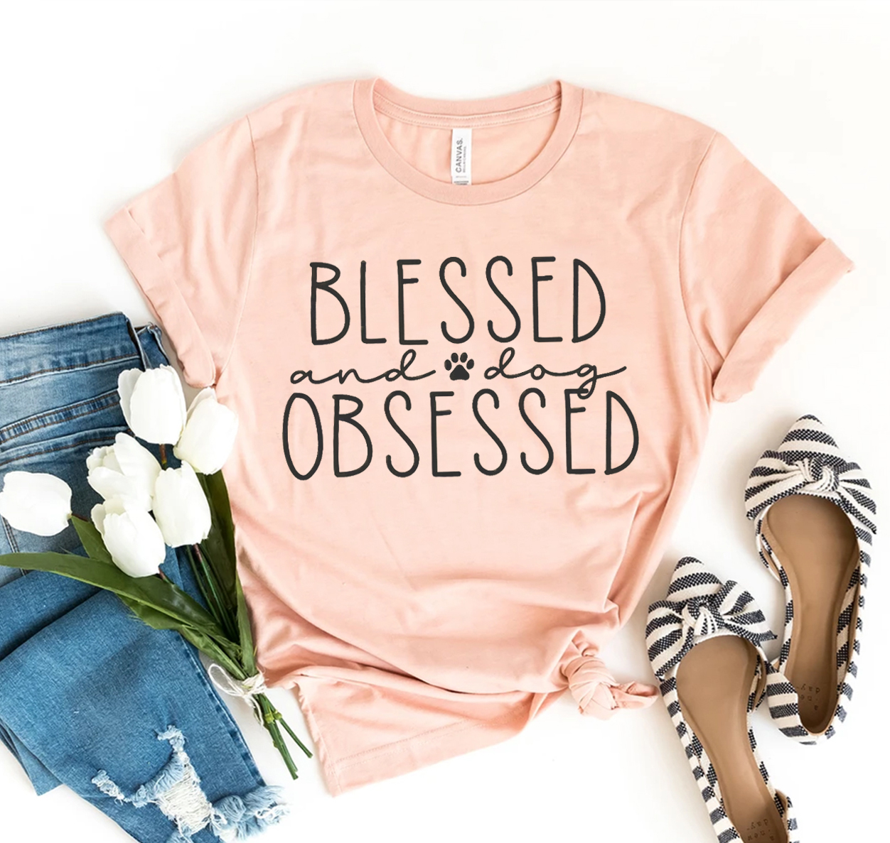 A stylish Blessed And Dog Obsessed T-shirt made from premium ring spun cotton, featuring a vibrant dog-themed design.