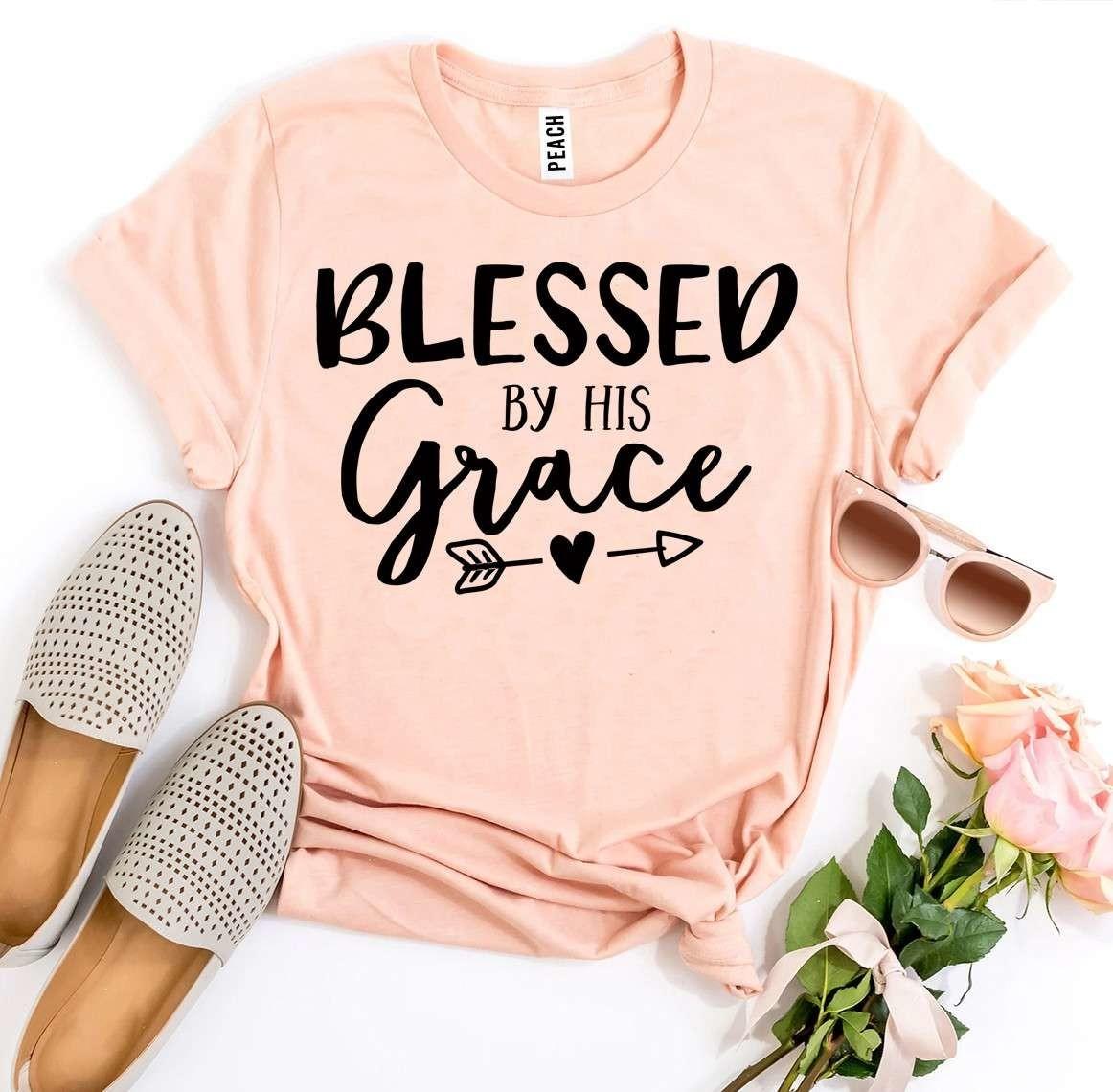 Blessed By His Grace T-shirt made of premium ring spun cotton with a soft textile flex print design.