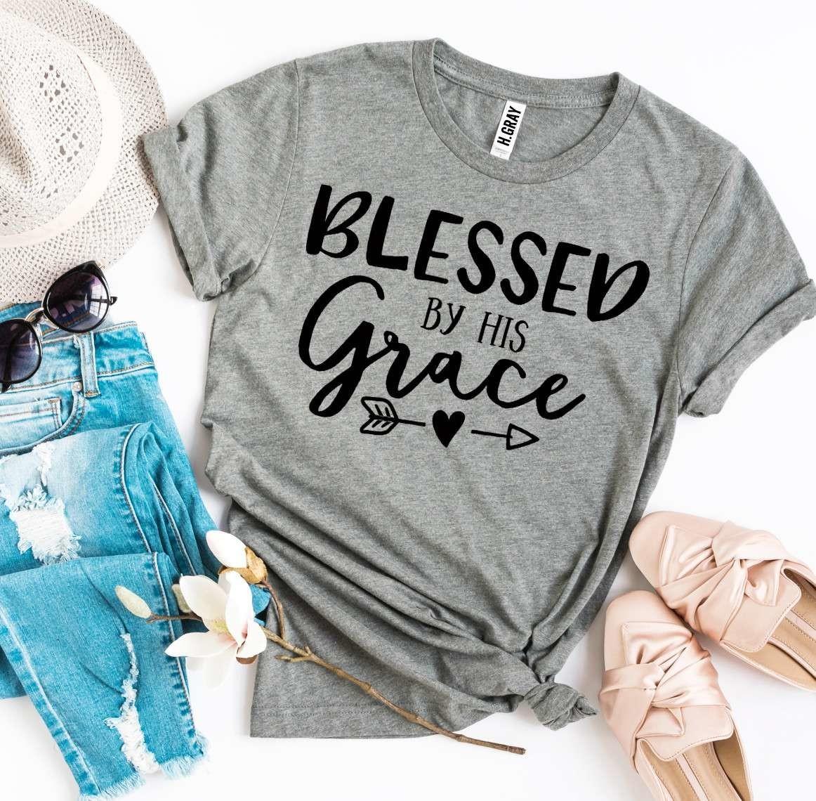 Blessed By His Grace T-shirt made of premium ring spun cotton with a soft textile flex print design.