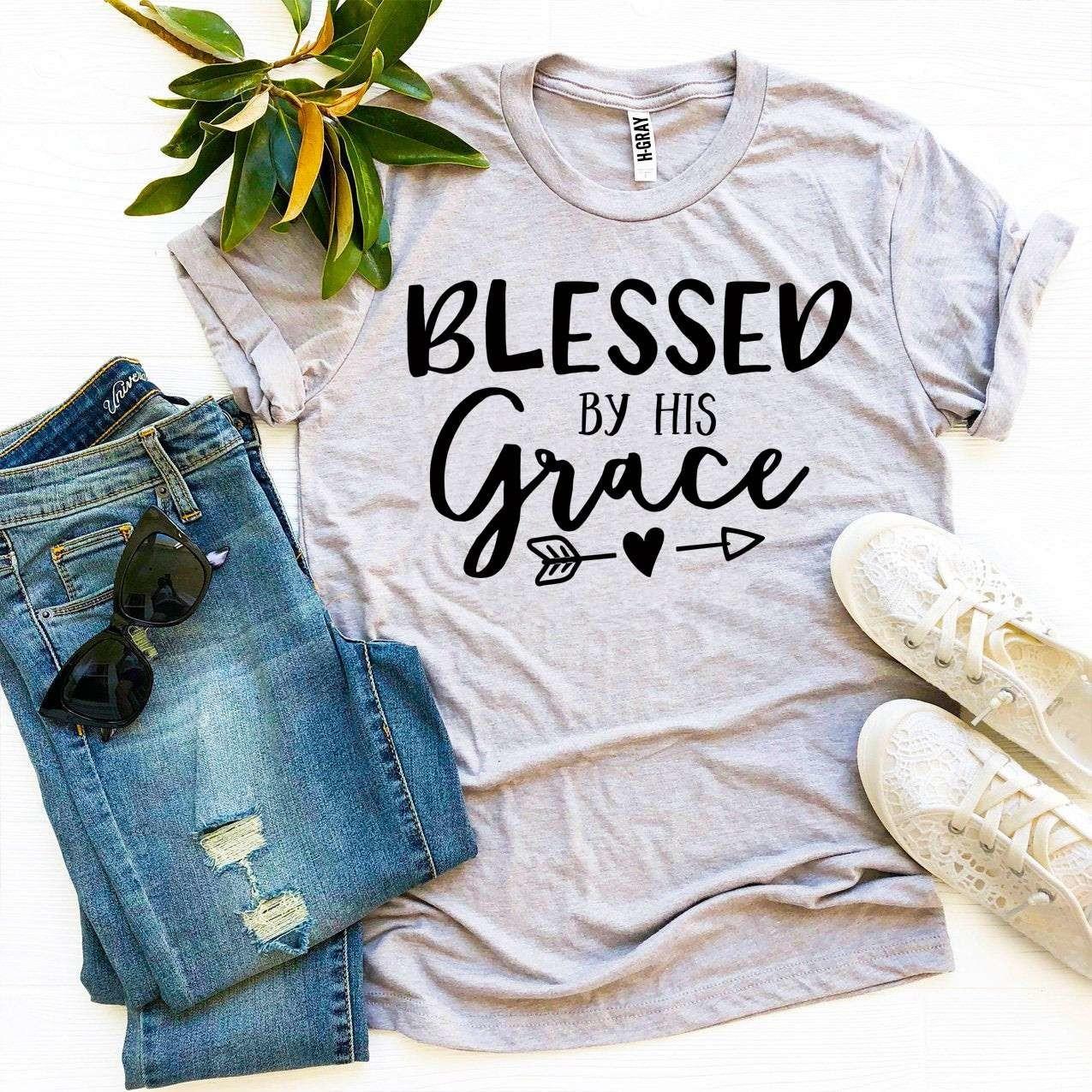 Blessed By His Grace T-shirt made of premium ring spun cotton with a soft textile flex print design.