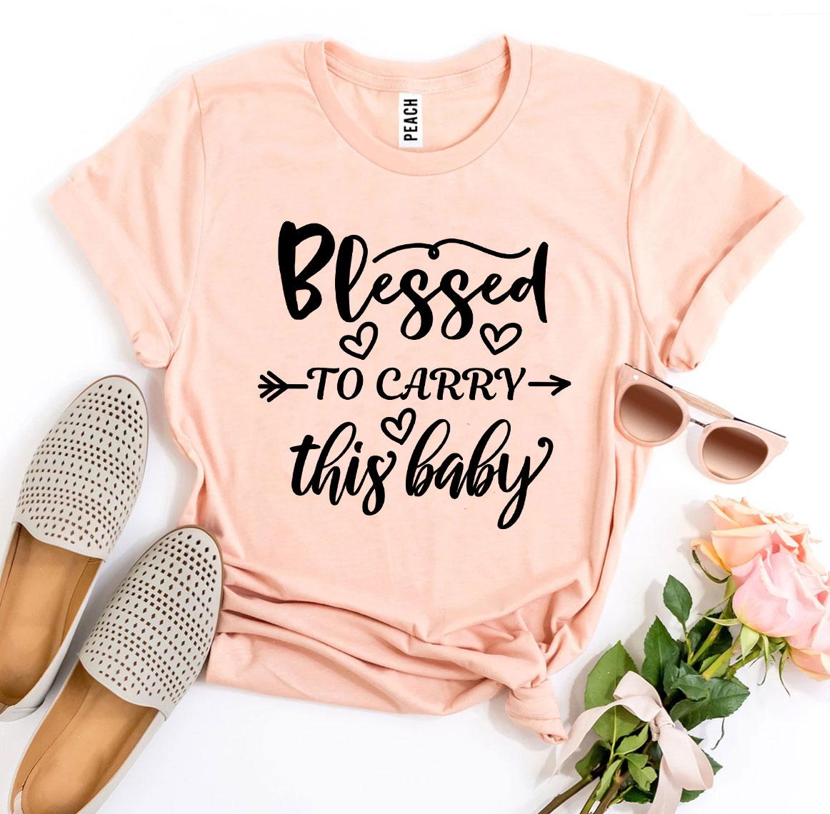 Blessed To Carry This Baby T-shirt made of soft ring spun cotton, featuring a high-quality flex print design.