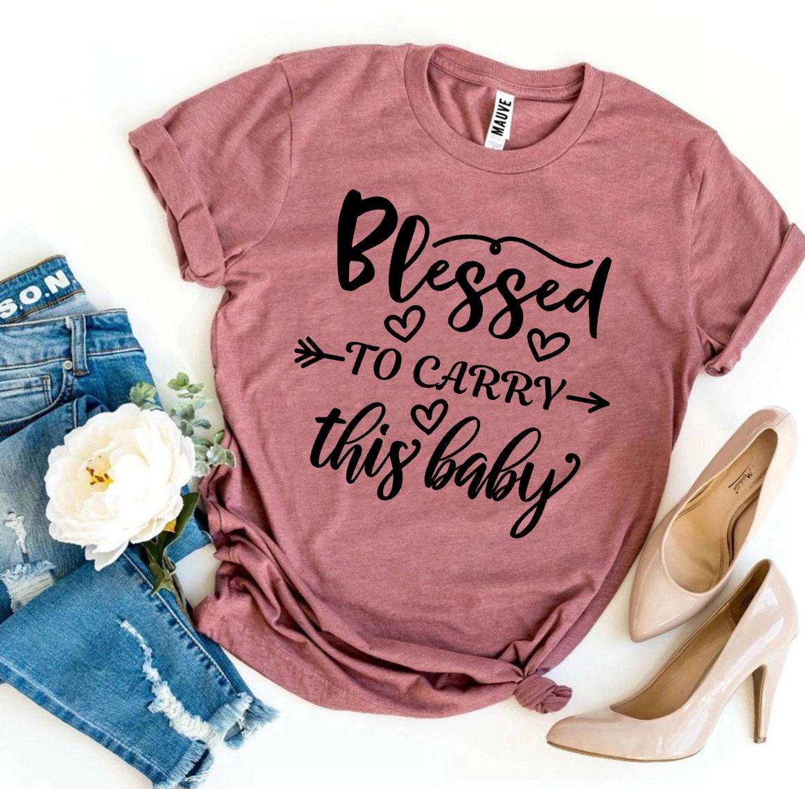 Blessed To Carry This Baby T-shirt made of soft ring spun cotton, featuring a high-quality flex print design.