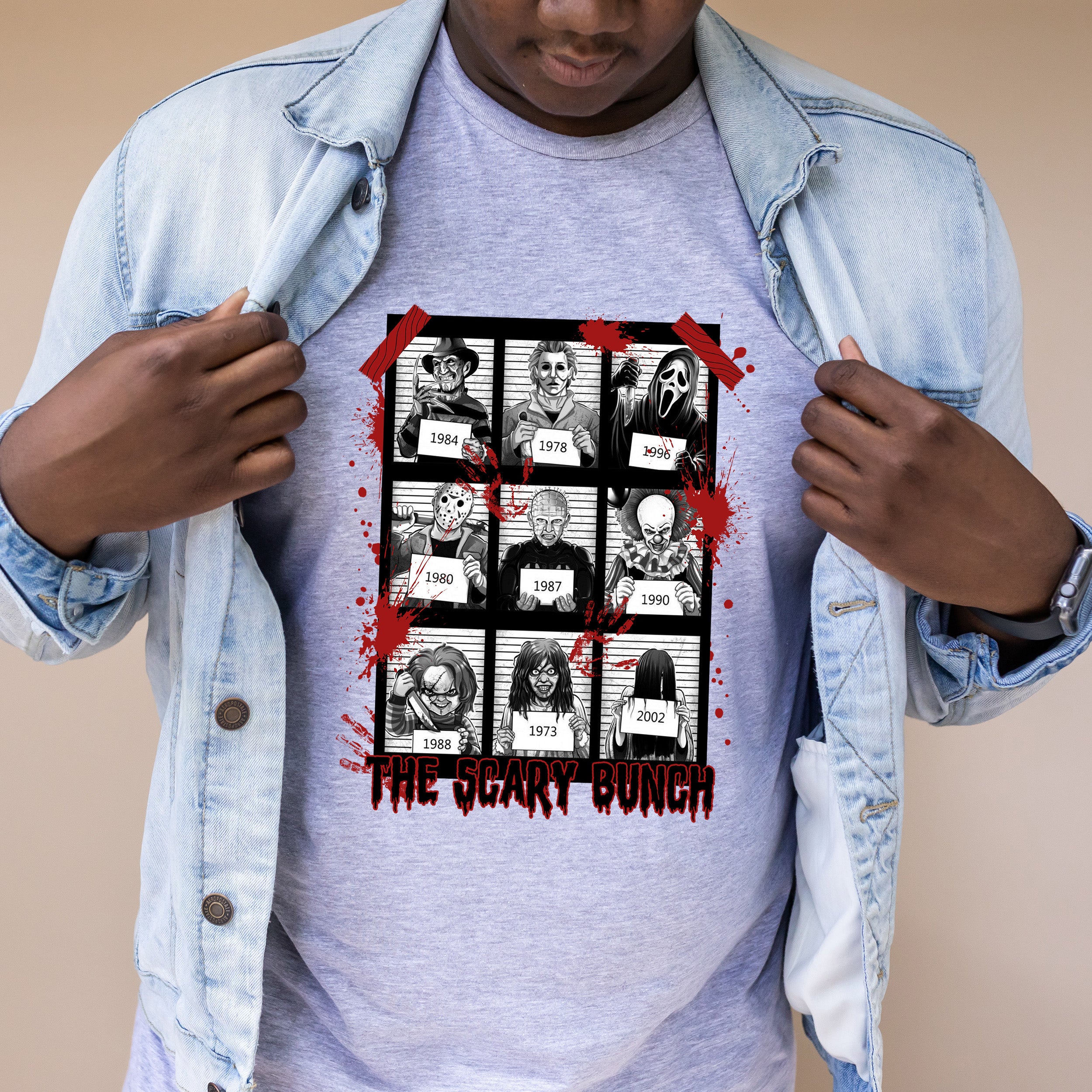 Bloody Horror Bunch Unisex T-shirt featuring a vibrant horror-themed graphic design, perfect for fans of spooky culture.