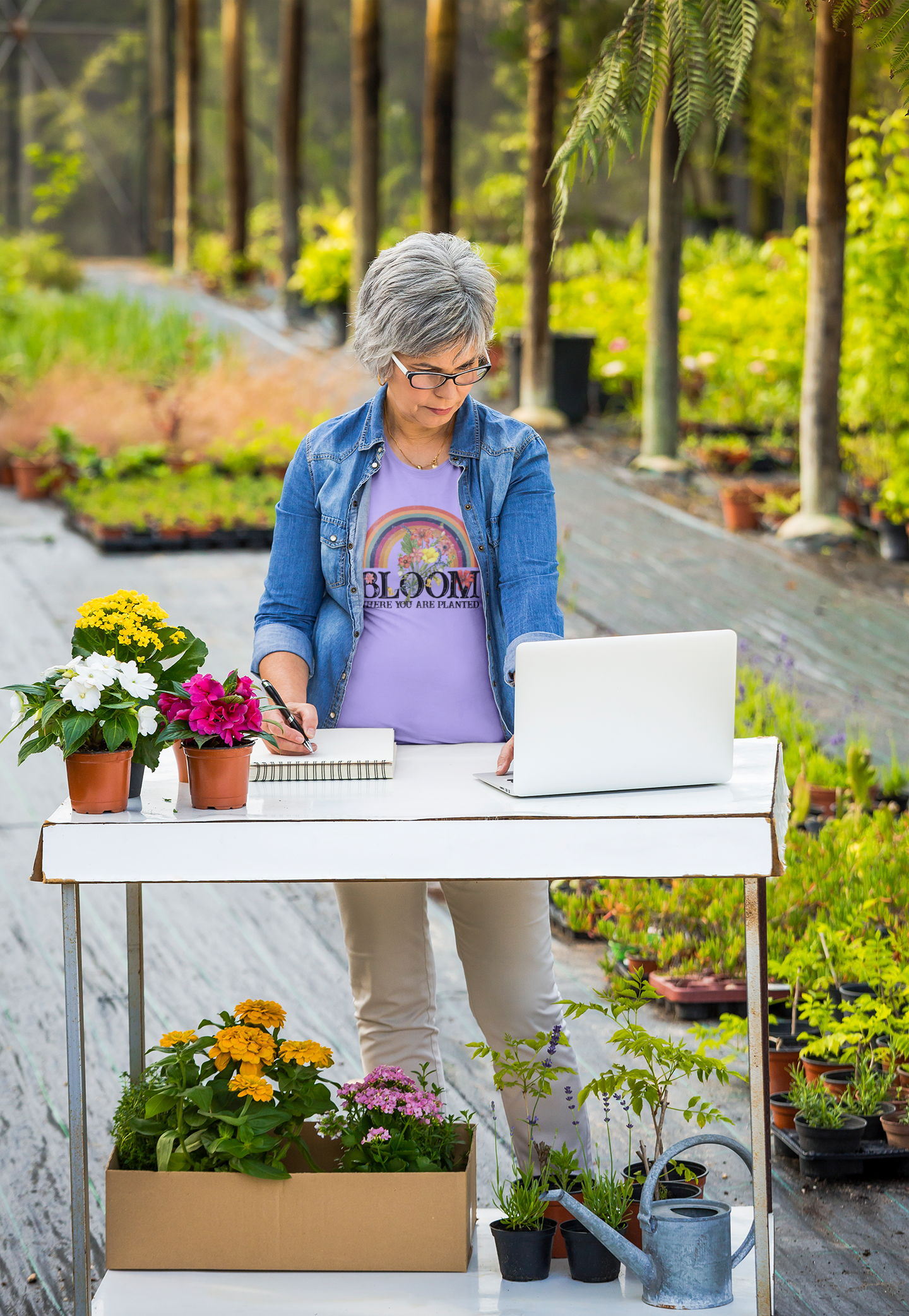 Bloom Where You Are Planted Unisex T-shirt featuring vibrant colors and inspirational text.