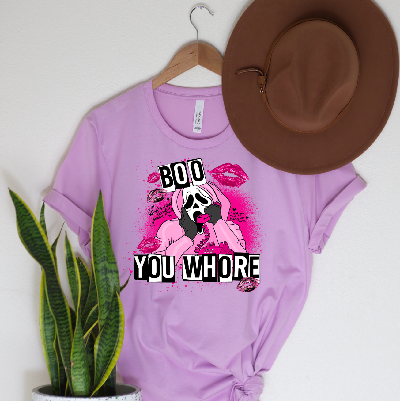 Boo You Whore Unisex T-shirt featuring a bold graphic design, perfect for casual wear.