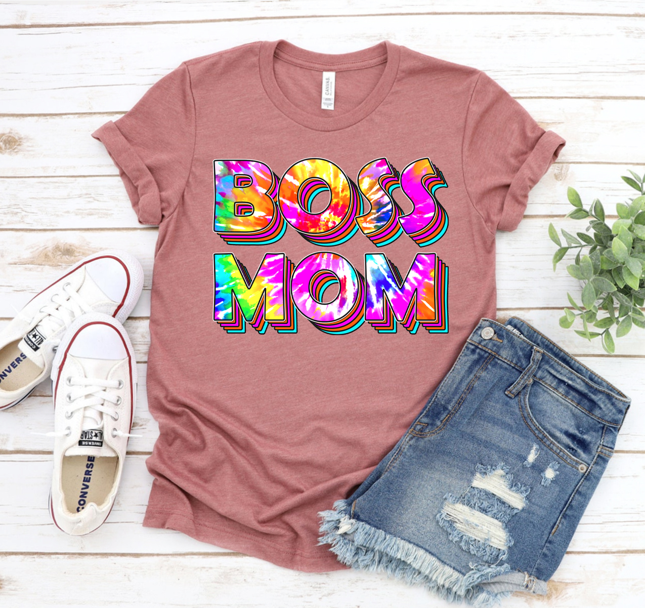 A stylish Boss Mom T-shirt made from soft, breathable cotton, featuring a classic unisex design suitable for all moms.