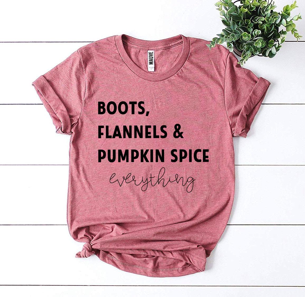 A cozy Boots, Flannels & Pumpkin Spice T-shirt made from premium cotton, featuring a stylish autumn-themed design.