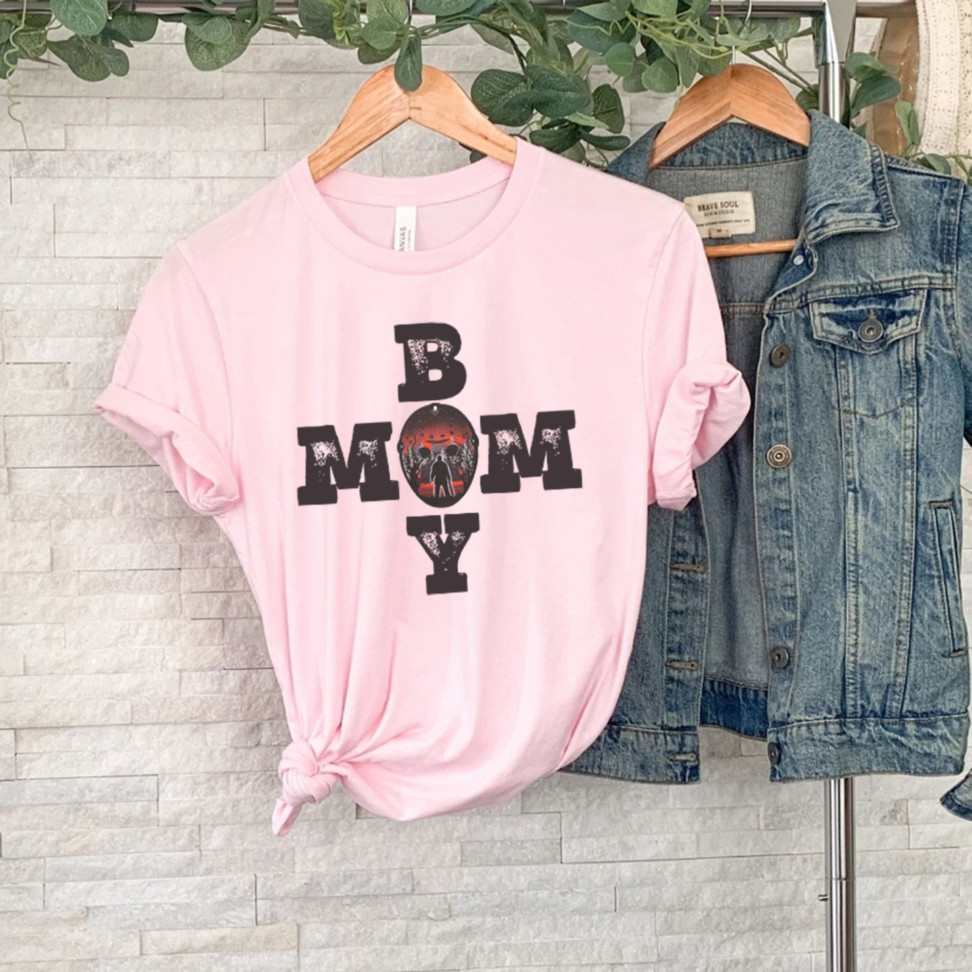 Boy Mom Horror Unisex T-shirt featuring a spooky design, perfect for stylish moms.