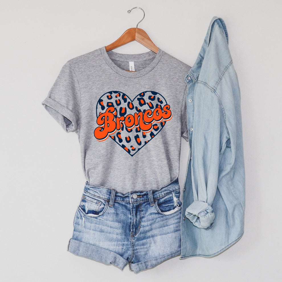 Broncos Leopard Heart Unisex T-shirt featuring a vibrant leopard heart design on a soft fabric.