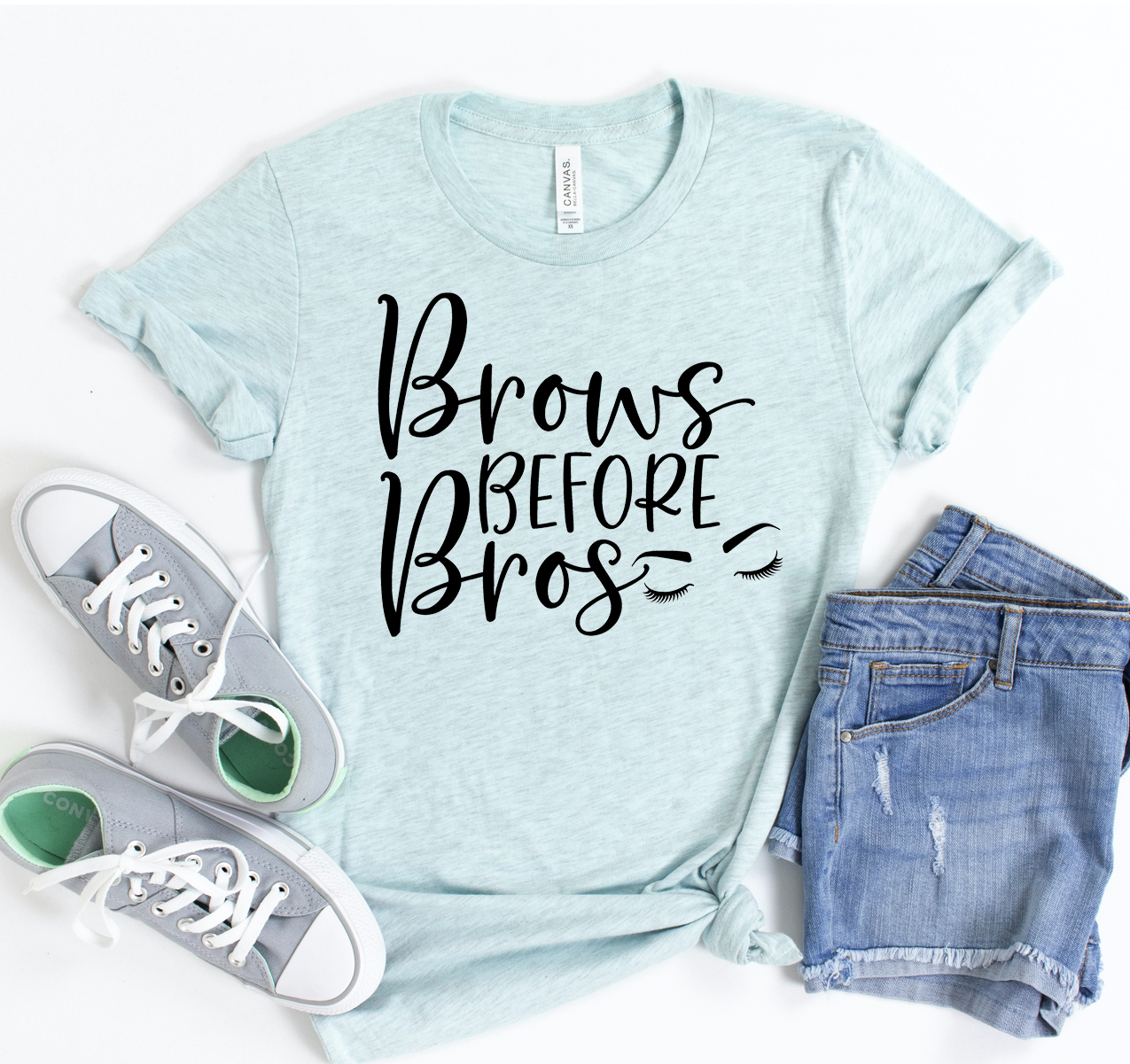 A stylish unisex Brows Before Bros T-shirt made from 100% airlume cotton, featuring a playful slogan in a classic design.