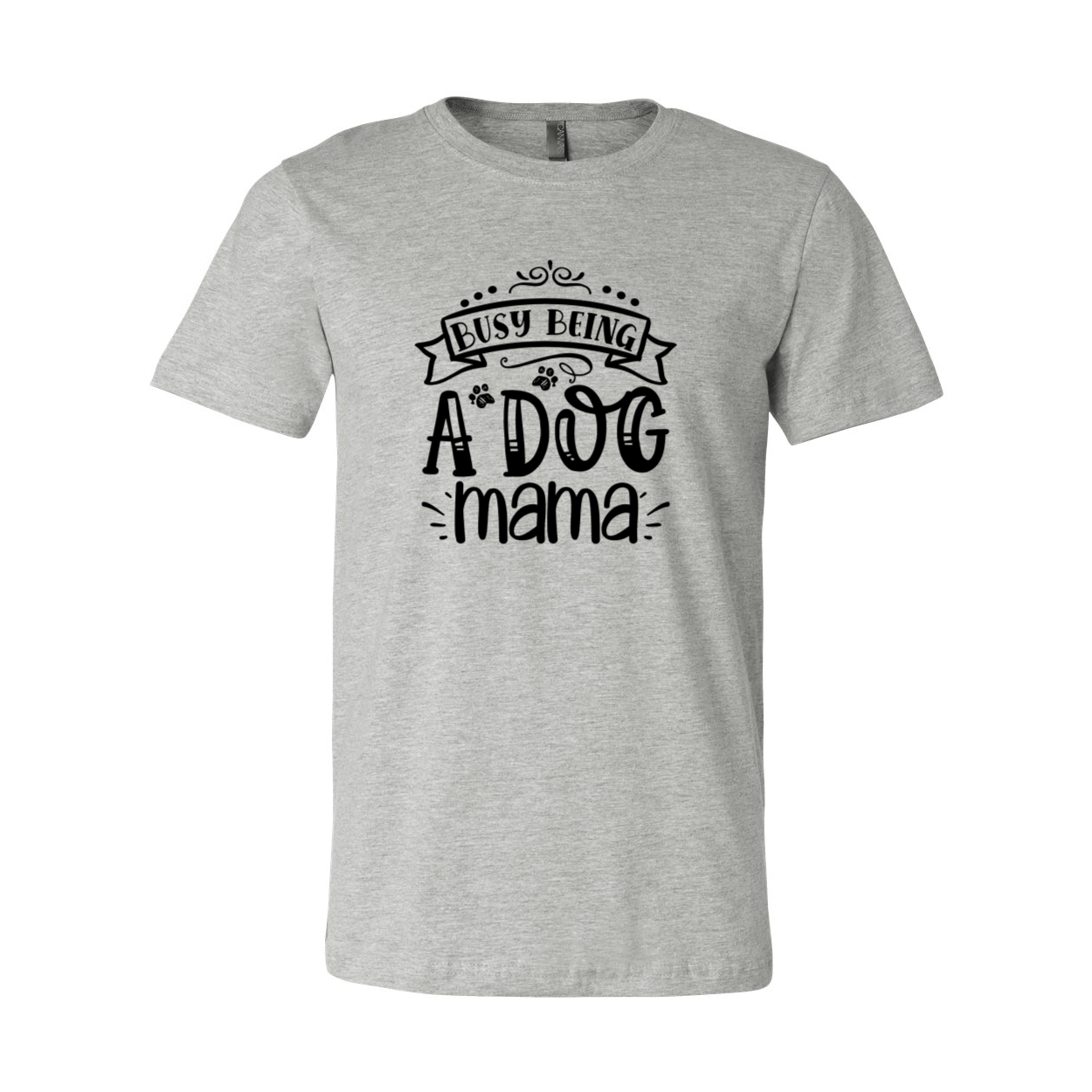 A comfortable unisex T-shirt featuring the phrase 'Busy being a dog mama' in stylish print, available in multiple colors.