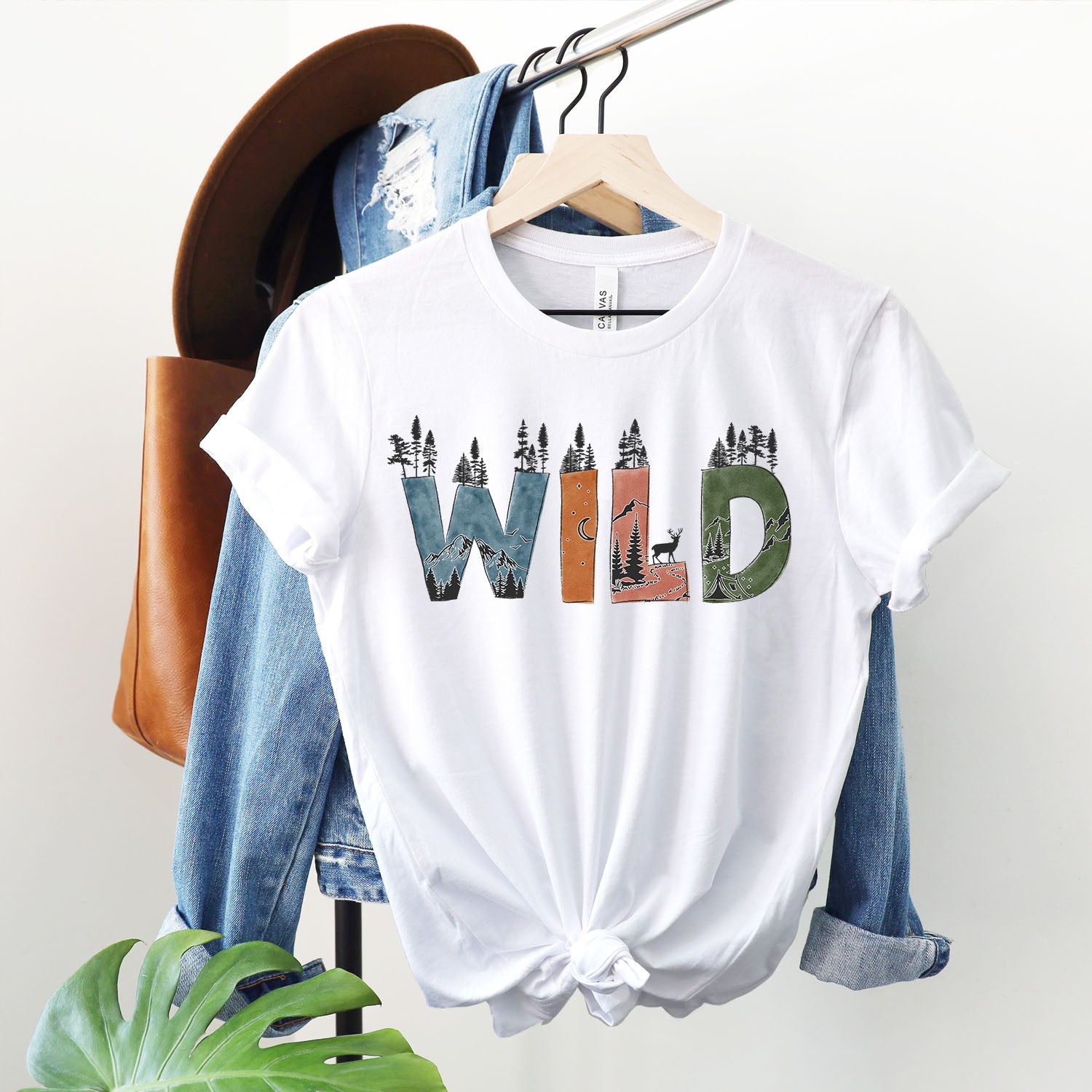 A stylish unisex t-shirt featuring a camping design, perfect for outdoor enthusiasts.