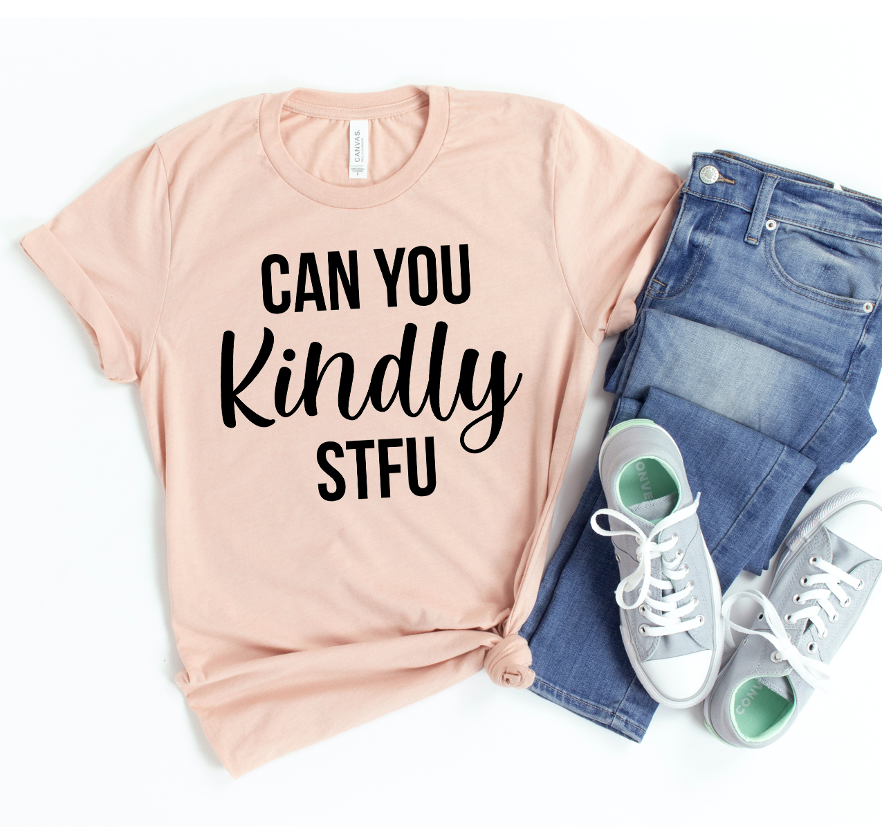 Can You Kindly STFU T-shirt displayed on a hanger, showcasing its unisex design and soft fabric.