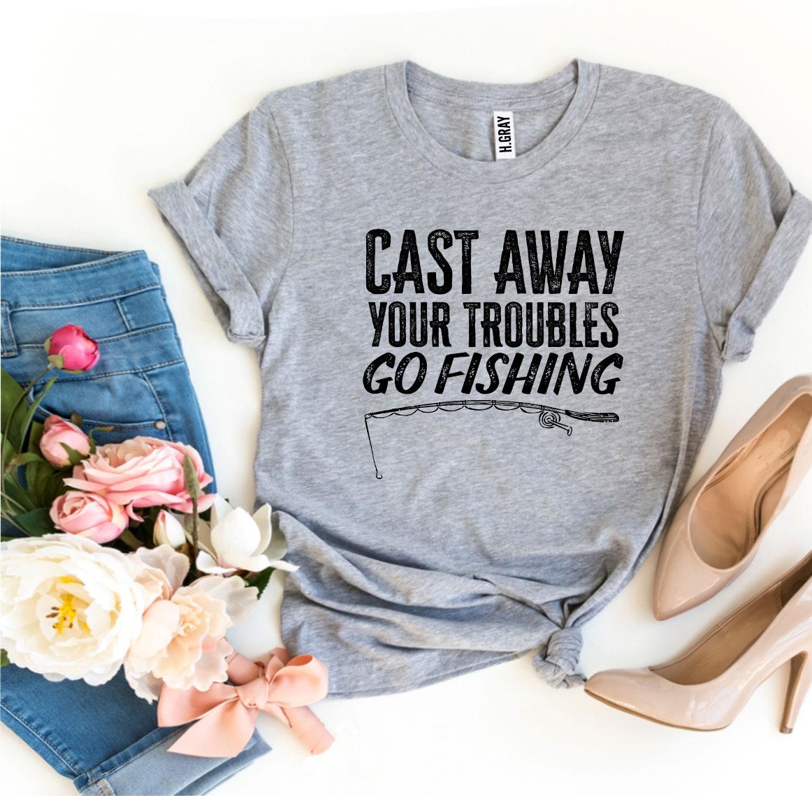 A stylish Cast Away Your Troubles Go Fishing T-shirt made from premium ring spun cotton, featuring a vibrant fishing-themed design.