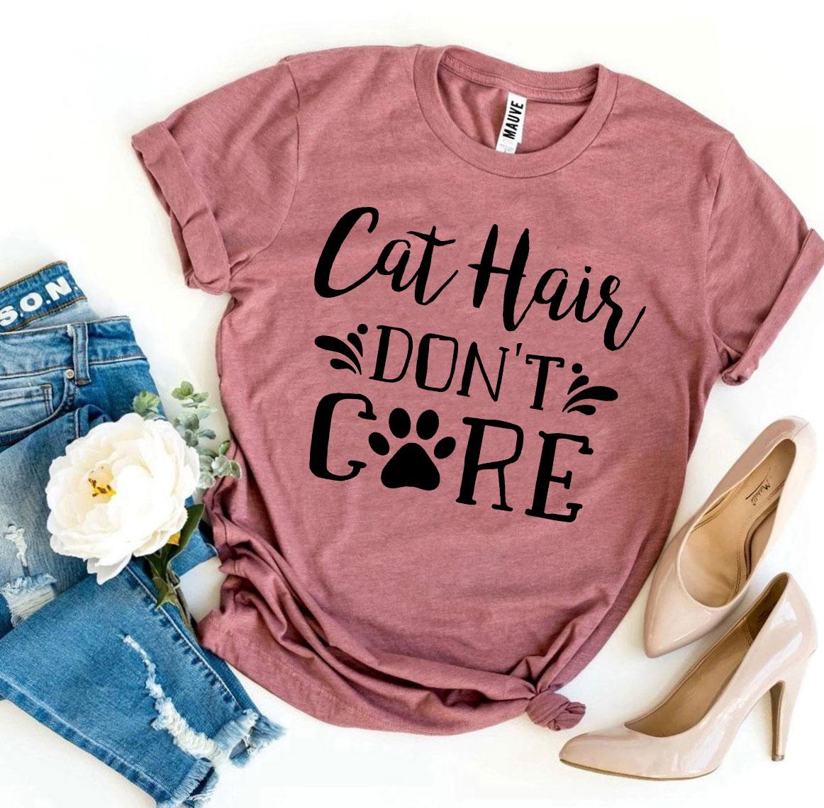 A stylish Cat Hair Don’t Care T-shirt made from premium ring spun cotton, featuring a humorous design perfect for cat lovers.