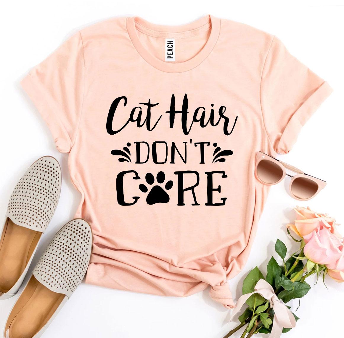 A stylish Cat Hair Don’t Care T-shirt made from premium ring spun cotton, featuring a humorous design perfect for cat lovers.