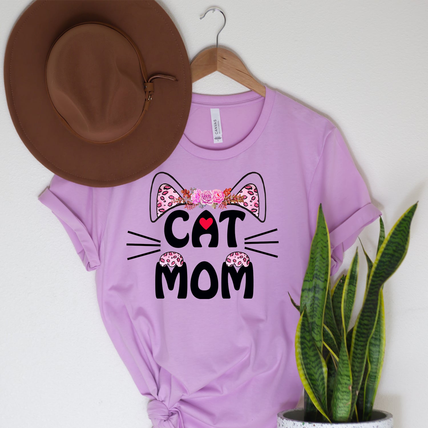 A stylish Cat Mom and Mini T-shirt featuring a cute cat graphic, perfect for cat lovers.