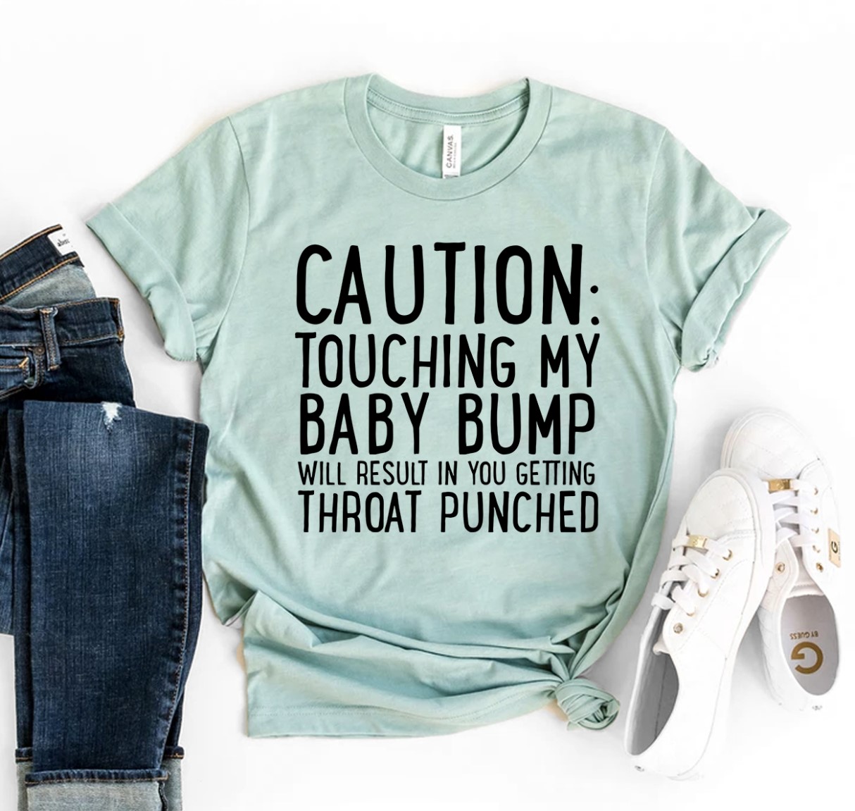 Caution Touching My Baby Bump Shirt made of soft ring spun cotton, featuring a playful design for expectant mothers.