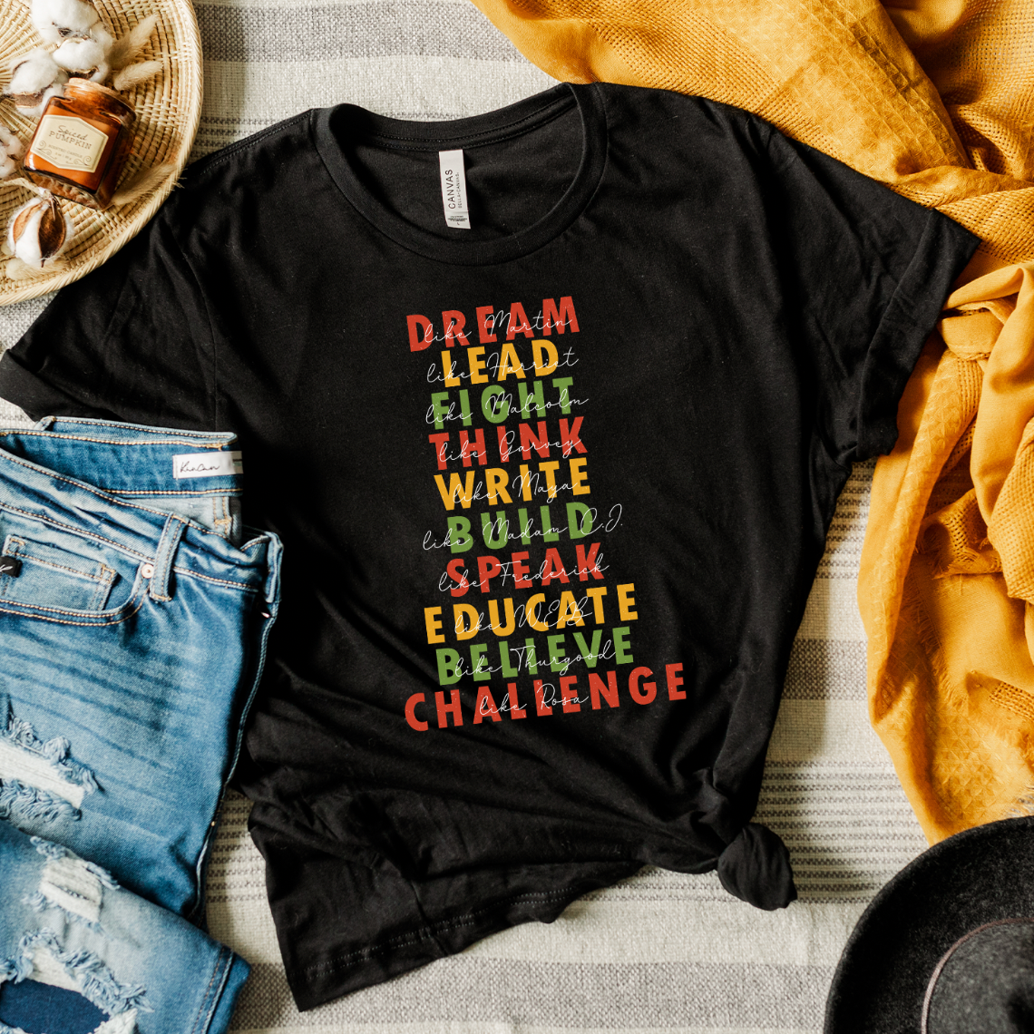 Celebrating Black History Unisex T-shirt featuring vibrant DTG printed design.