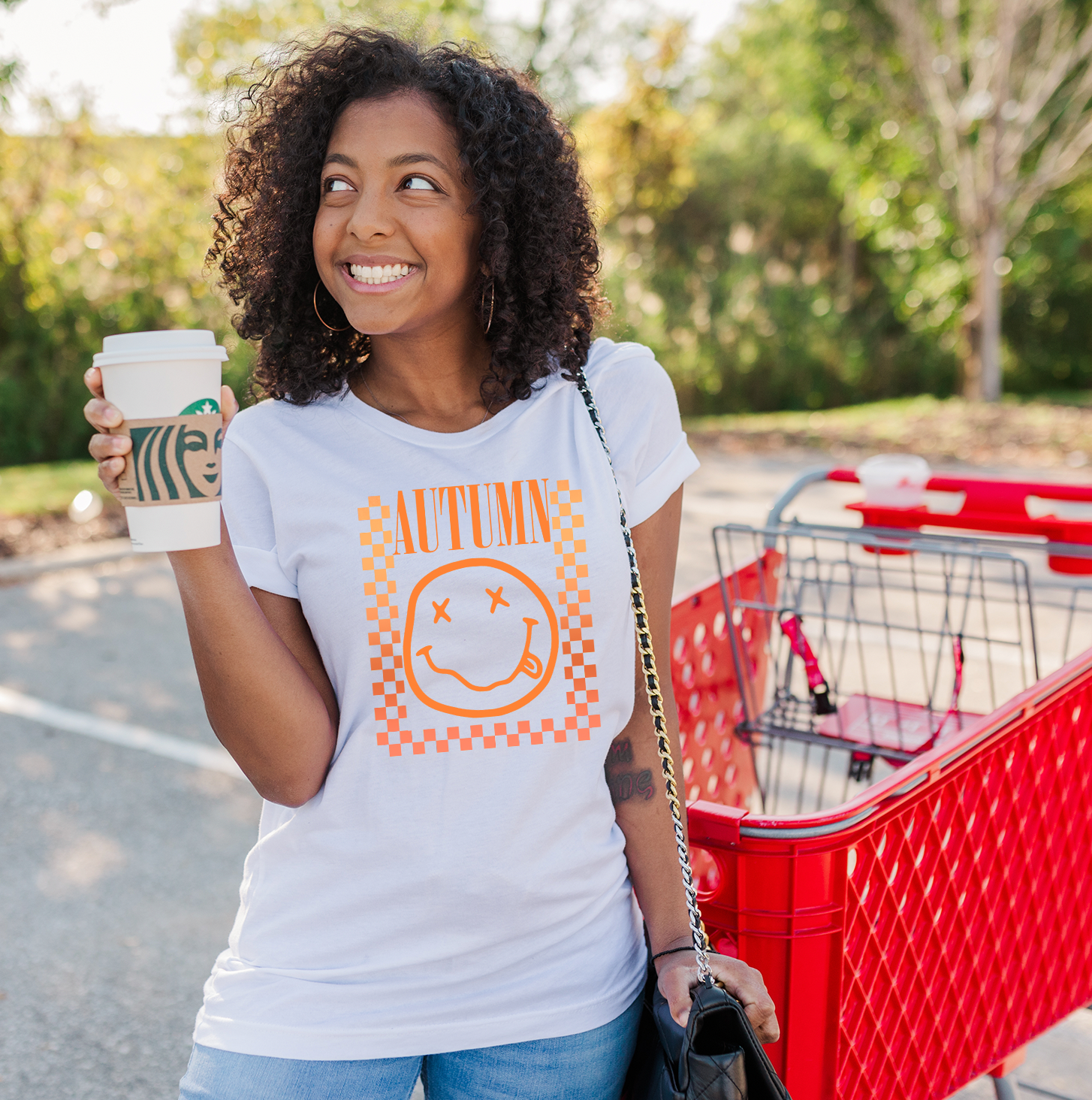 Checkered Autumn Unisex T-shirt featuring a vibrant checkered pattern, perfect for fall fashion.