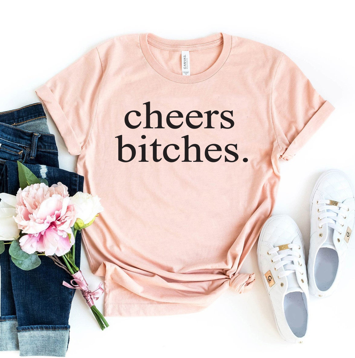 Cheers Bitches T-shirt made of premium ring spun cotton with a vibrant print, available in various sizes.