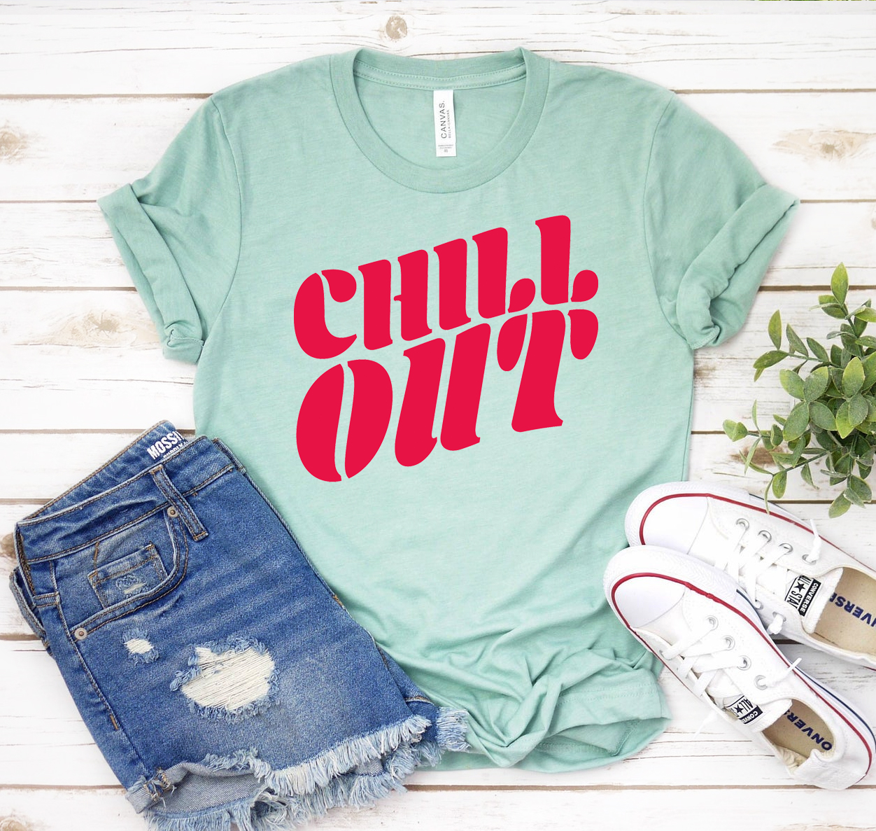 Chill Out T-shirt in various colors, showcasing its soft fabric and unisex design.