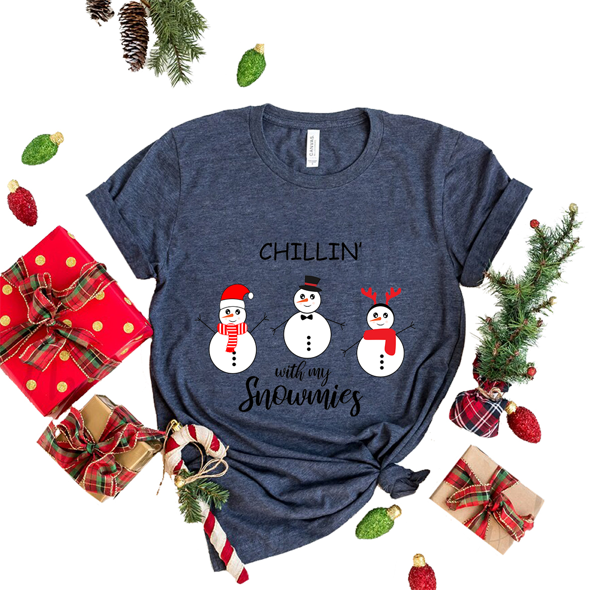 Chillin With My Snowmies Shirt featuring playful snowman design, crafted from soft ring spun cotton, available in multiple colors.