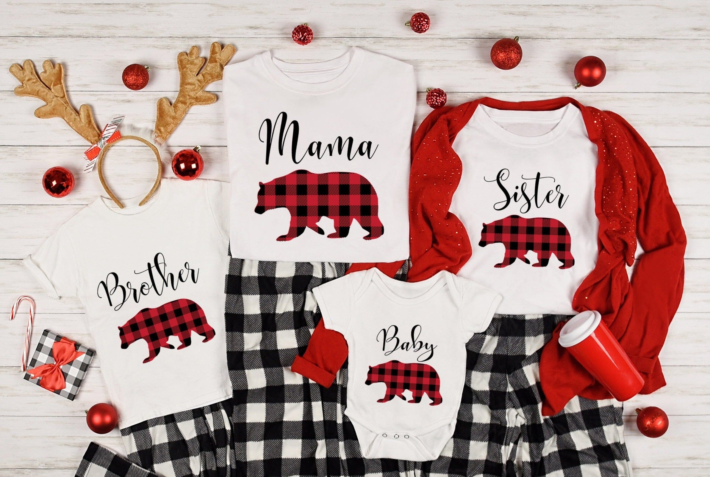 A cozy Christmas Baby Bear Onesie in festive colors, featuring a cute bear design and three-snap closure for easy dressing.