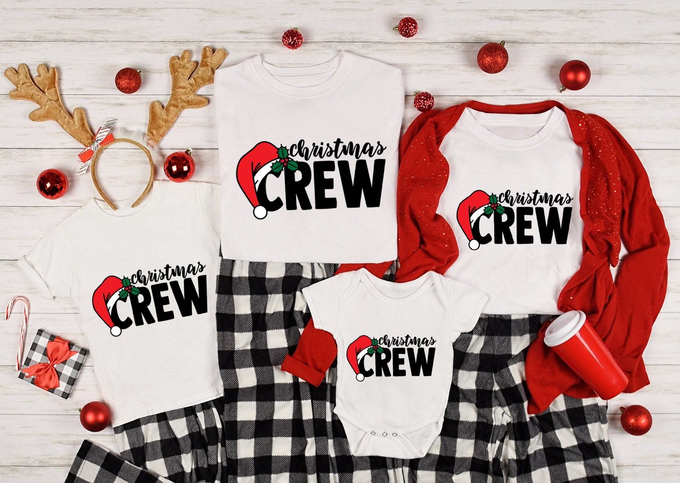 A festive Christmas Crew Onesie in vibrant colors, featuring a cute design perfect for holiday celebrations and family photos.