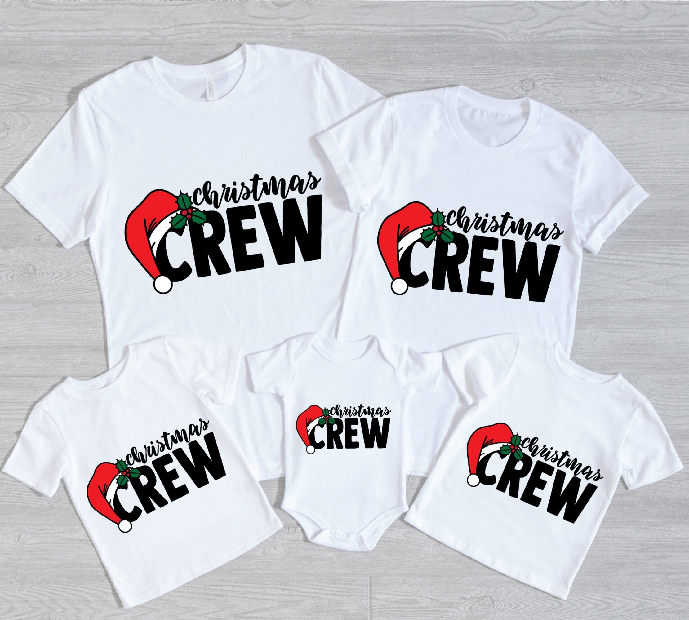 A festive Christmas Crew Toddler Tee featuring a cute design, made from 100% cotton, perfect for holiday celebrations.