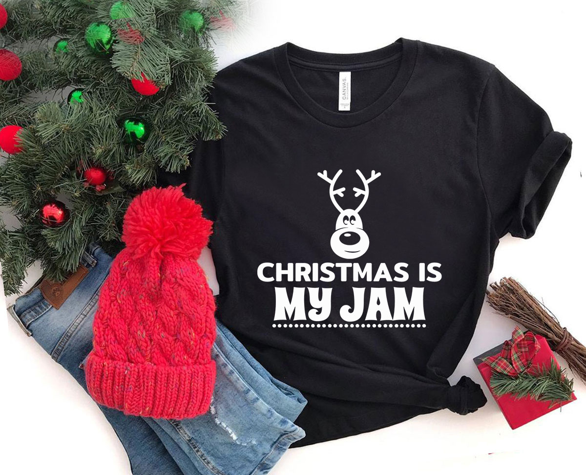 A festive unisex T-shirt featuring the phrase 'Christmas Is My Jam', made from soft ring spun cotton, available in multiple colors.