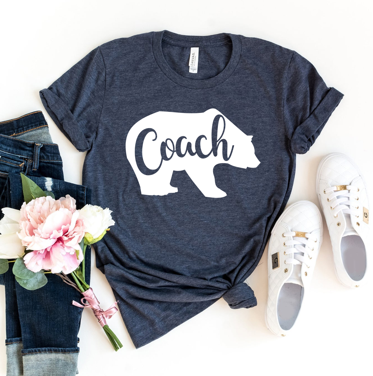 A stylish Coach Bear T-shirt made from premium ring spun cotton, featuring a vibrant flex print design.