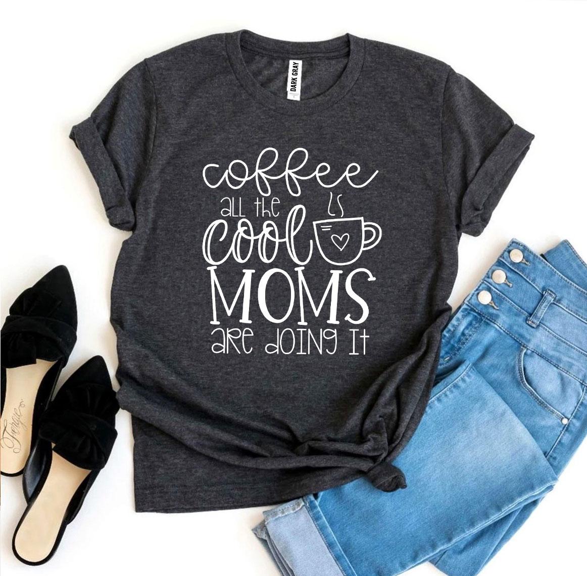 A stylish t-shirt featuring the phrase 'Coffee All The Cool Moms Are Doing It', made from soft ring spun cotton.