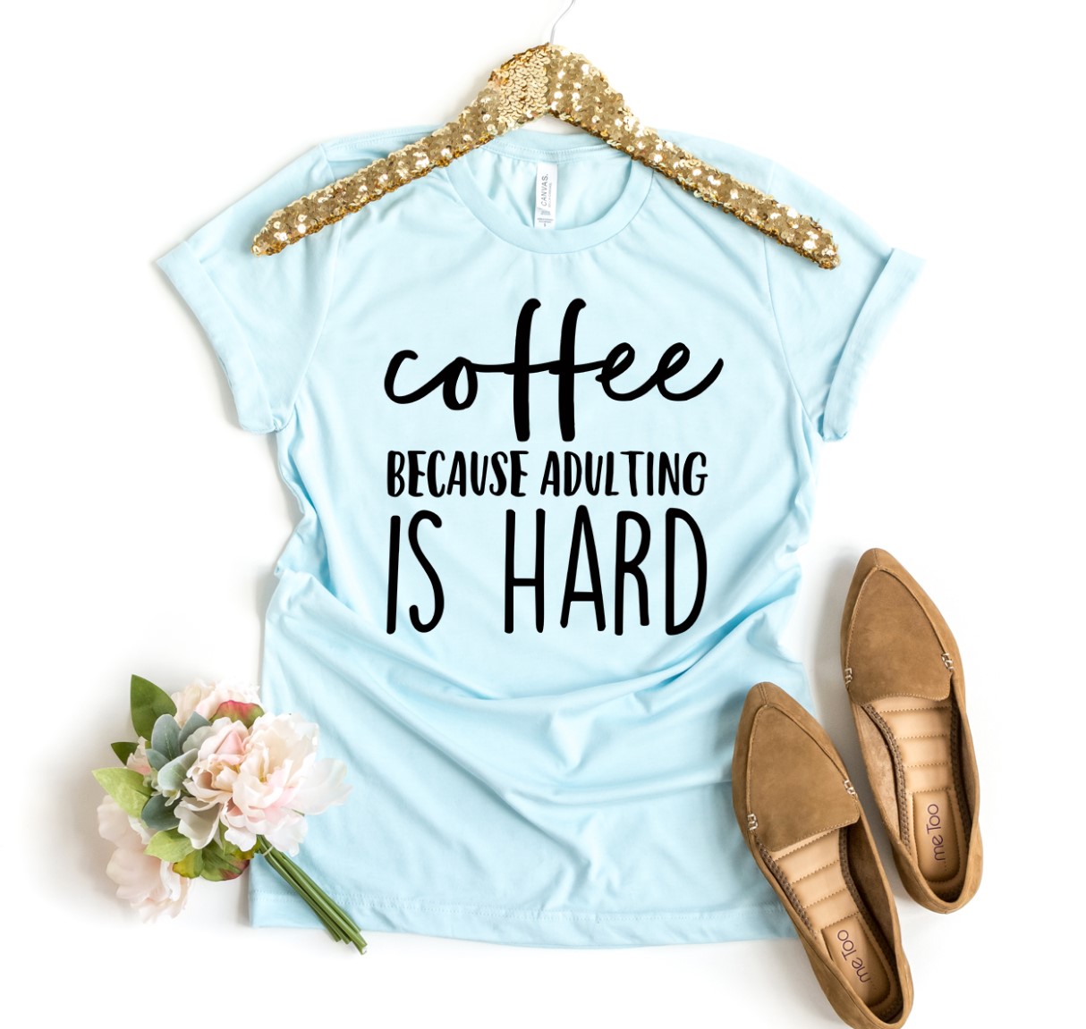 Coffee Because Adulting is Hard T-shirt made of premium ring spun cotton, featuring a humorous design perfect for coffee lovers.