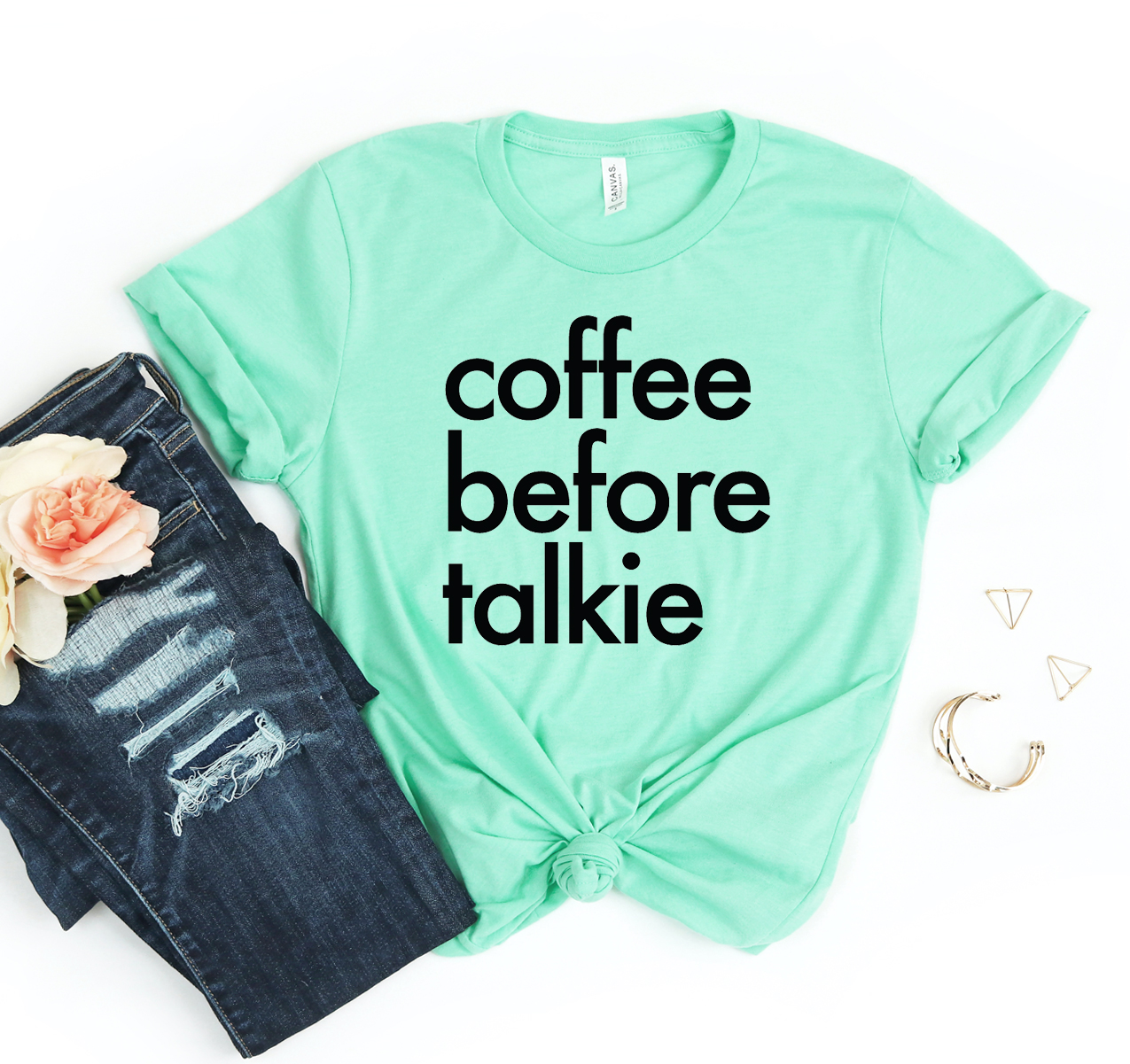 A stylish unisex Coffee Before Talkie T-shirt made from soft cotton, featuring a fun coffee-themed graphic.