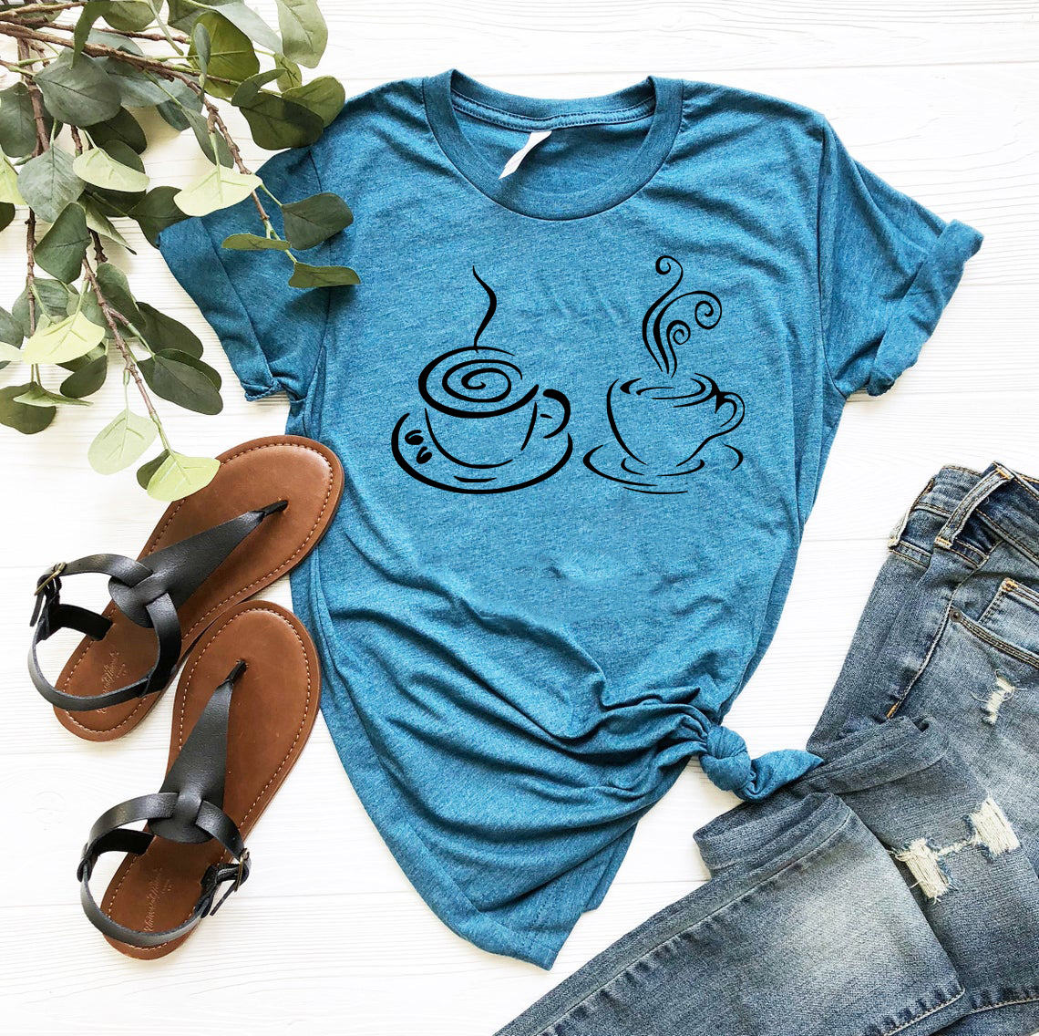 A stylish unisex Coffee Shirt made from soft ring spun cotton, available in various colors and sizes.