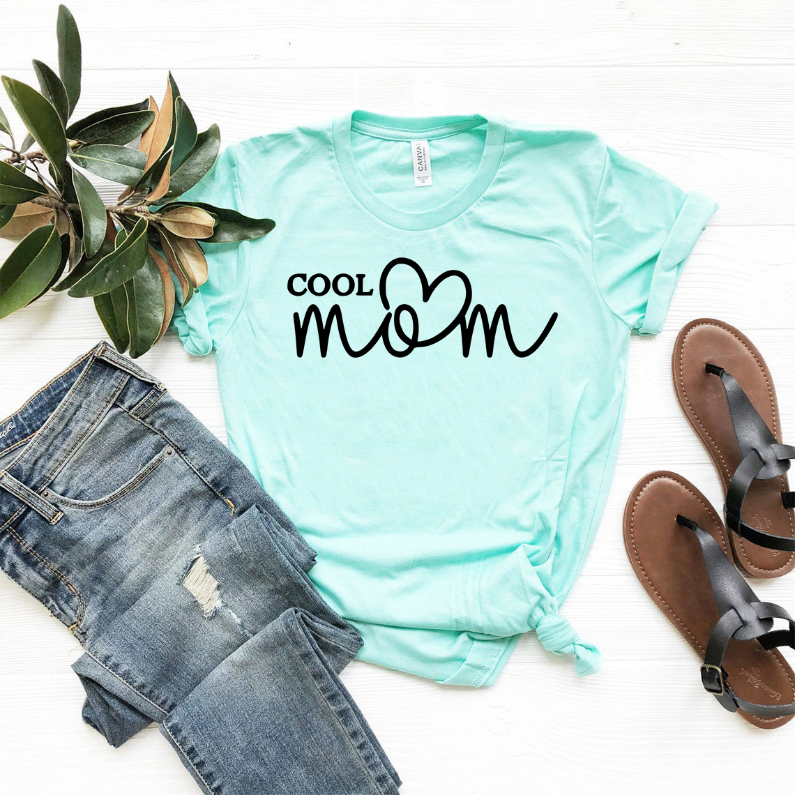 A stylish Cool Mom Shirt made from soft ring spun cotton, featuring a crew neck and available in multiple colors.