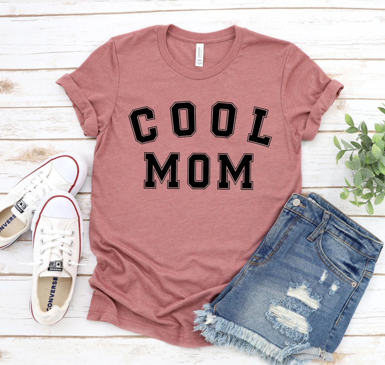 Cool Mom T-shirt displayed on a mannequin, showcasing its unisex design and soft fabric.