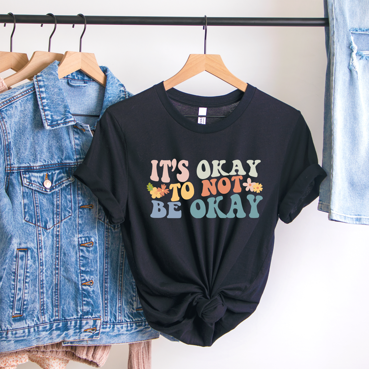 Colorful It's Okay Not To Be Okay T-shirt featuring vibrant design and comfortable fabric, promoting mental health awareness.