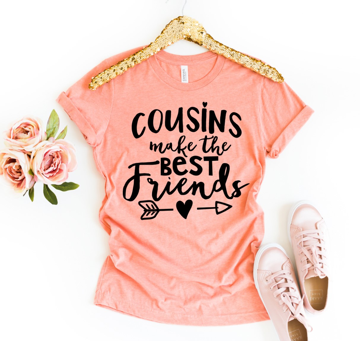 Cousins Make The Best Friends T-shirt in various sizes, showcasing its soft cotton fabric and vibrant print.