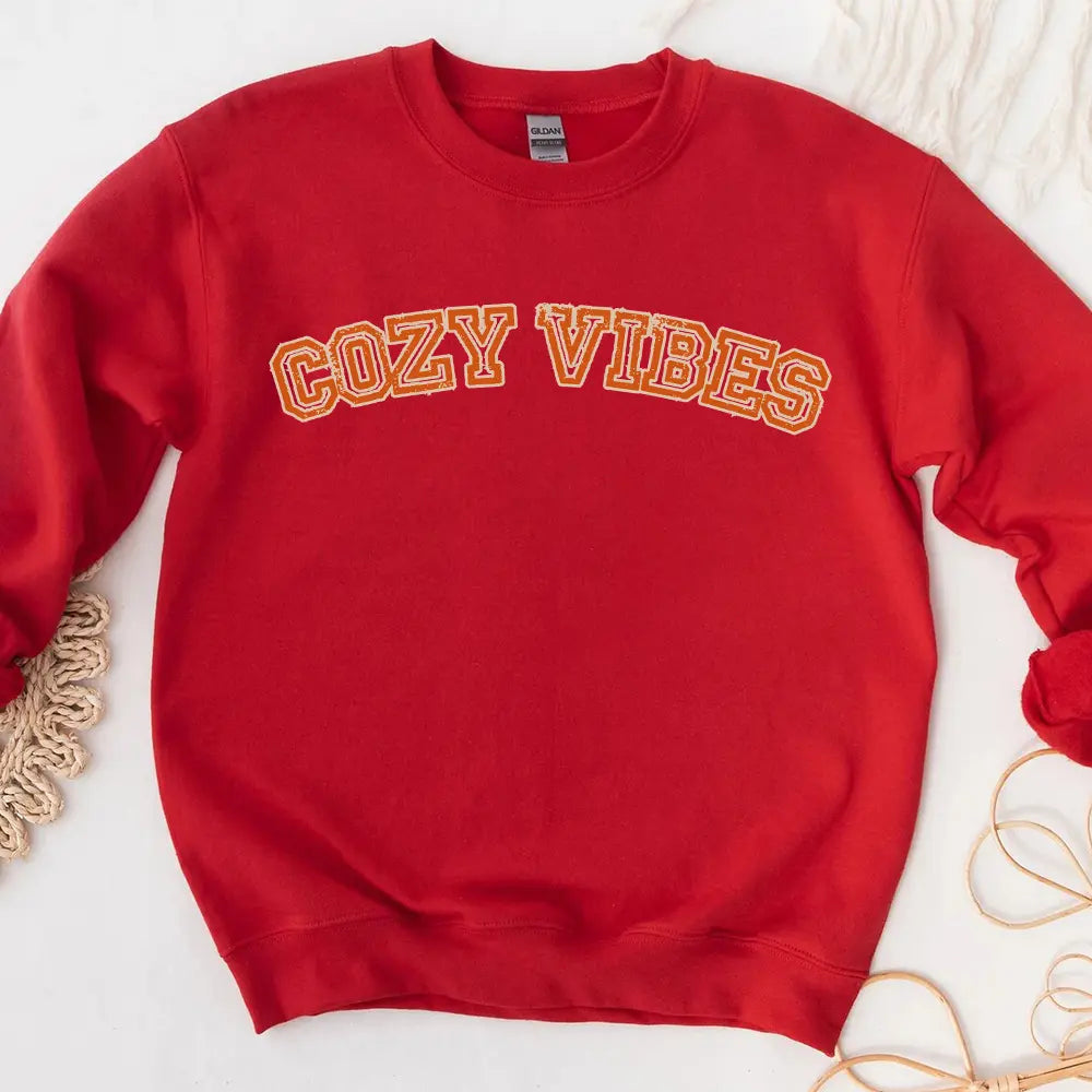 Cozy Vibes Fall Sweatshirt in a warm autumn color, showcasing its comfortable fit and stylish design, perfect for casual wear.